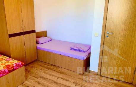 Two-bedroom apartment in an apartment complex without a swimming pool - Photo 11